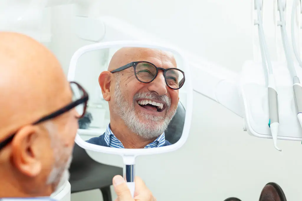 Dental provider explaining care recommendations to a patient