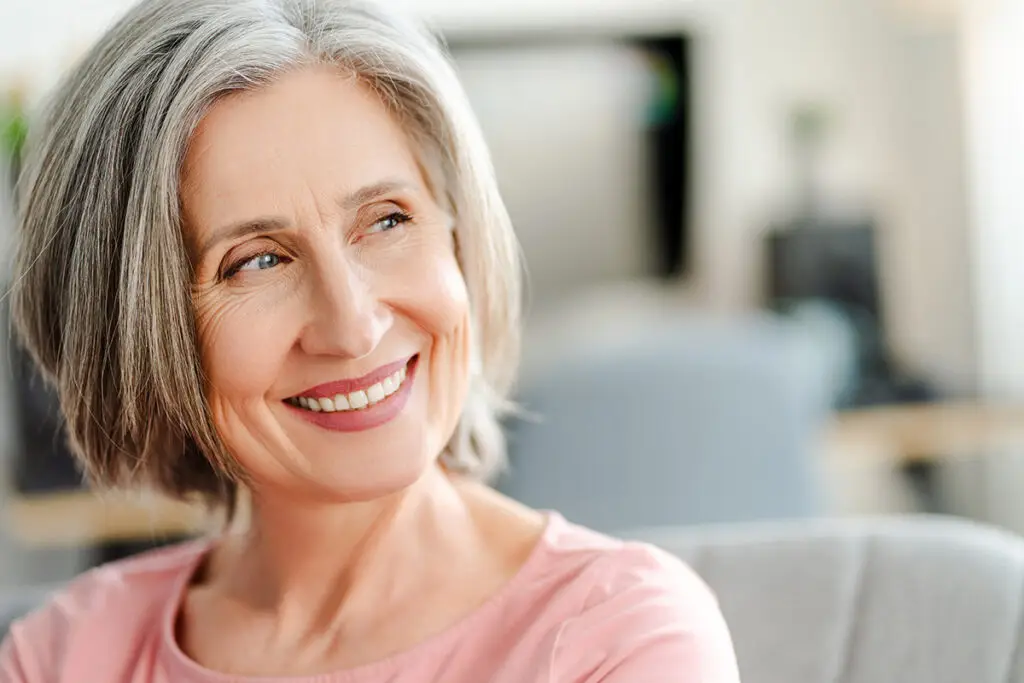 Smiling patient feeling confident about dental care